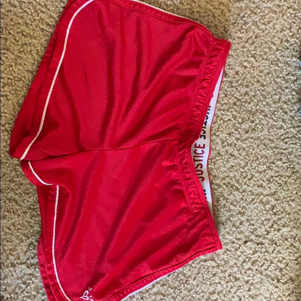 Red athletic justice shorts